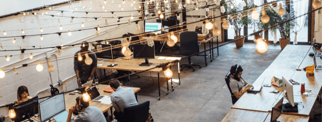 small business working in open plan office